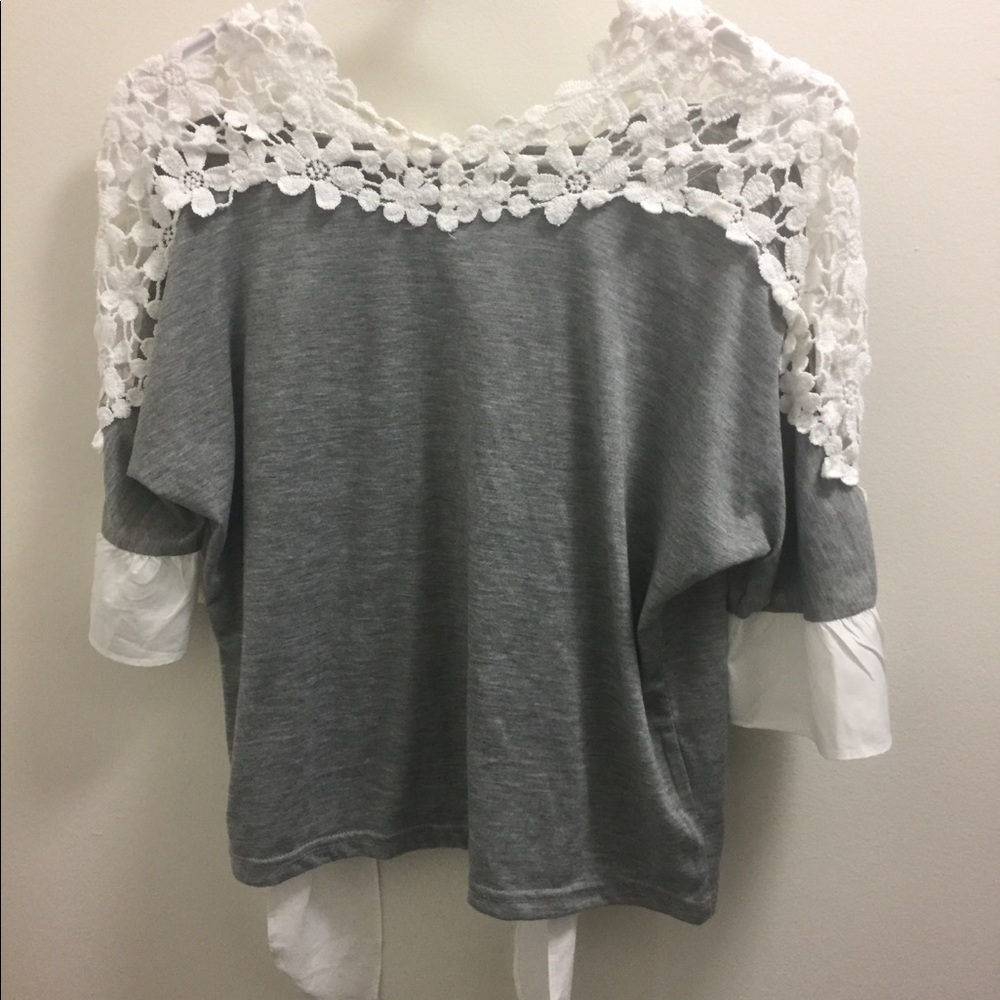 grey and white shirt